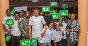 Students, volunteers, and organizers pose with ILEE placards during the 2026 Campus Liberty Summit at Kwame Nkrumah University of Science and Technology (KNUST) in Kumasi, Ghana.