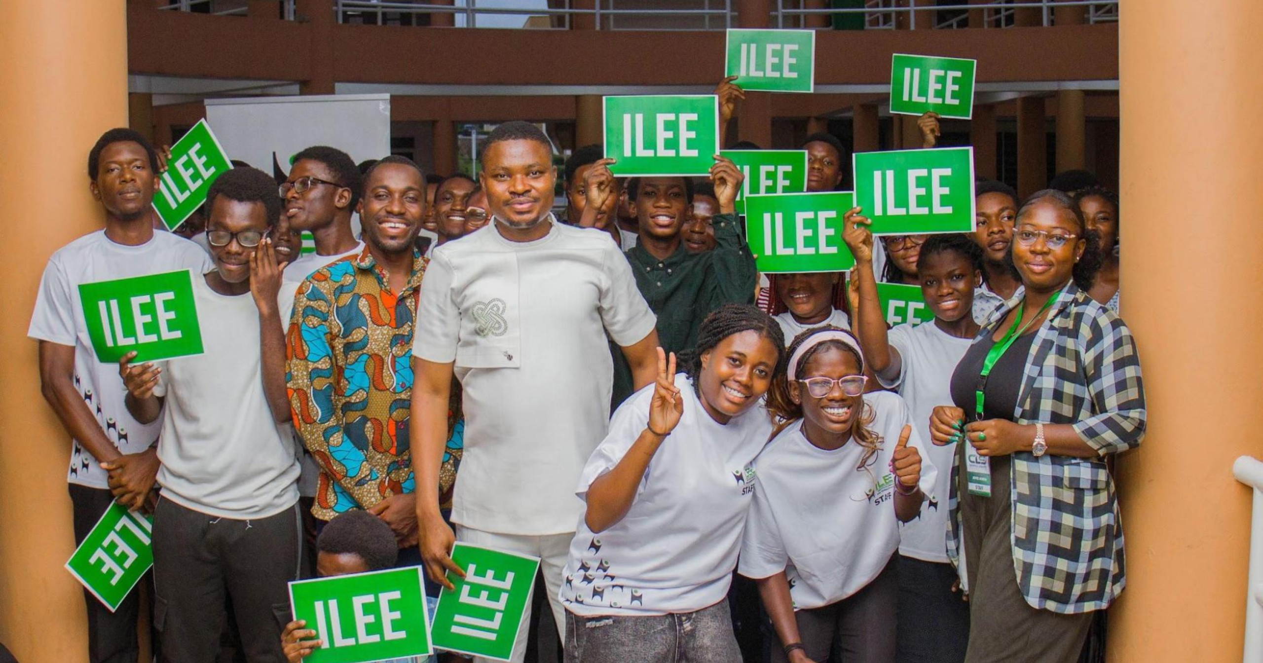 Students, volunteers, and organizers pose with ILEE placards during the 2026 Campus Liberty Summit at Kwame Nkrumah University of Science and Technology (KNUST) in Kumasi, Ghana.