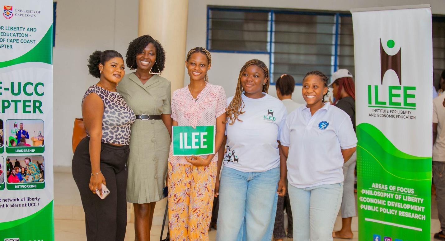 Five ILEE-UCC members pose with an ILEE placard during the Campus Liberty Summit at the University of Cape Coast.