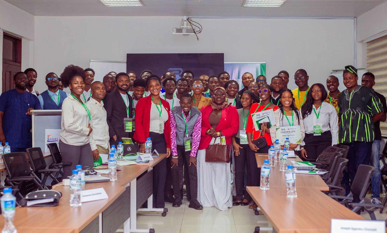 Nyansapo Fellowship 2026 fellows and speakers gather for a group photo at the ISSER Auditorium, University of Ghana.